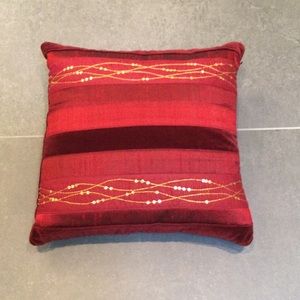 Lovely petite red pillow with gold trim